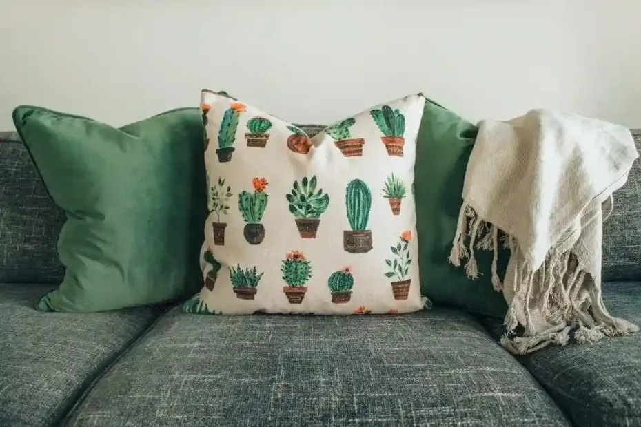 Como decorar sofá com manta e almofadas
